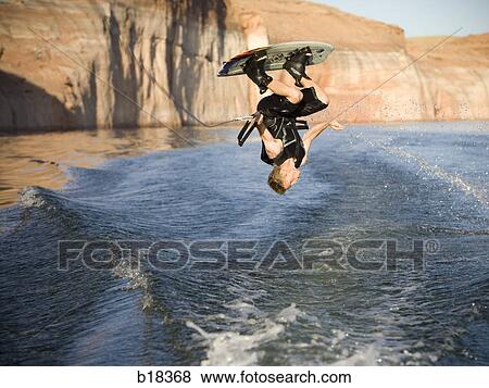 Man on a wakeboard. View Large Photo Image Stock Photo - Man on a wakeboard.. Fotosearch