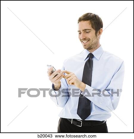 man on his iPhone View Large Photo Image Stock Image - man on his iPhone. Fotosearch