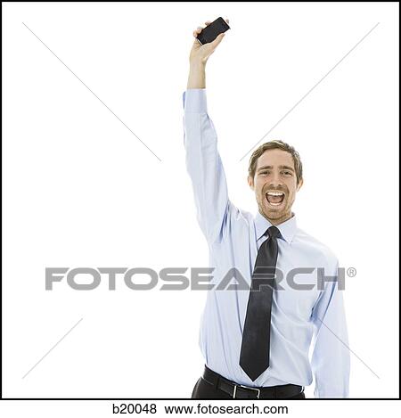 man on his iPhone View Large Photo Image Stock Photo - man on his iPhone. Fotosearch