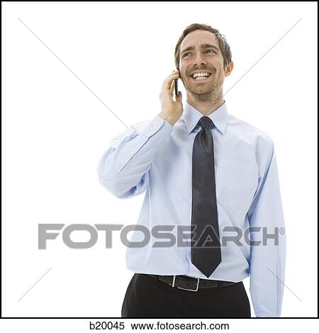 Stock Photography - man on his iPhone. Fotosearch