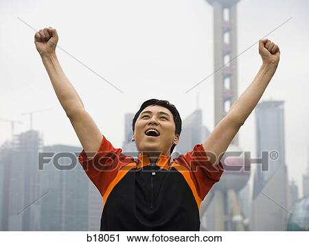 Man raising arms in the air. View Large Photo Image Stock Image - Man raising arms in the air.. Fotosearch