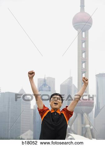 Man raising arms in the air. View Large Photo Image Stock Image - Man raising arms in the air.. Fotosearch