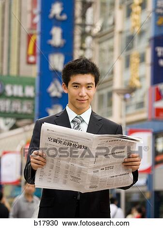 Man reading a newspaper. View Large Photo Image Stock Image - Man reading a newspaper.. Fotosearch