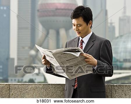 Man reading a newspaper. View Large Photo Image Stock Image - Man reading a newspaper.. Fotosearch