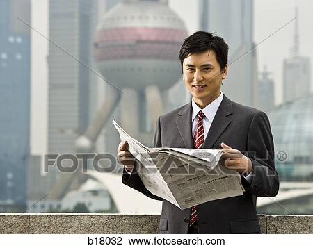 Man reading a newspaper. View Large Photo Image Stock Image - Man reading a newspaper.. Fotosearch
