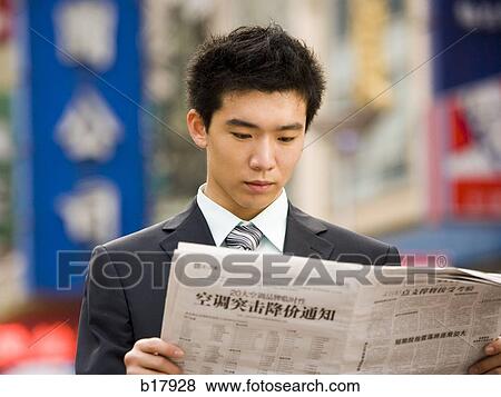 Man reading a newspaper. View Large Photo Image Stock Photo - Man reading a newspaper.. Fotosearch