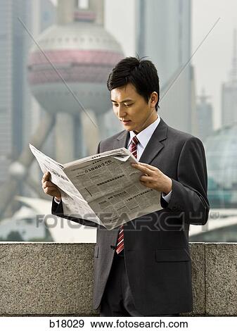 Man reading a newspaper. View Large Photo Image Stock Photo - Man reading a newspaper.. Fotosearch