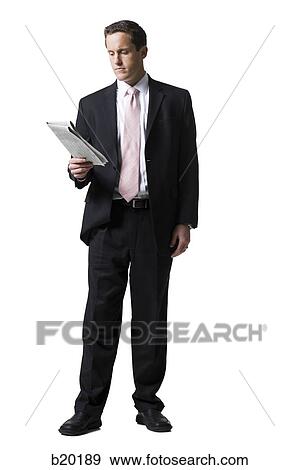 man reading a newspaper View Large Photo Image Stock Photo - man reading a newspaper. Fotosearch