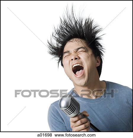 Man rocking out with mic stand. View Large Photo Image Stock Photo - Man rocking out with mic stand.. Fotosearch