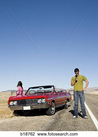 man with a broken down car. View Large Photo Image Stock Image - man with a broken down car.. Fotosearch