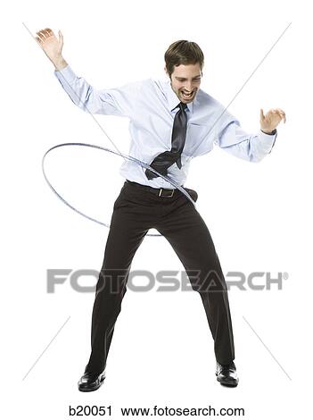 Stock Image - man with a hula hoop. Fotosearch
