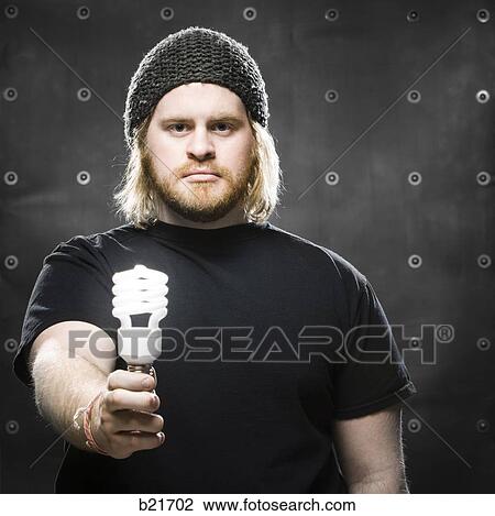 man with a light bulb View Large Photo Image Stock Image - man with a light bulb. Fotosearch