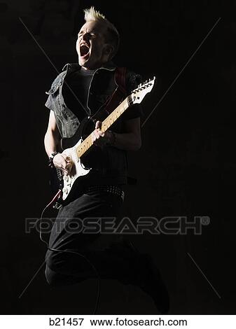 Stock Photo - man with a mohawk. Fotosearch