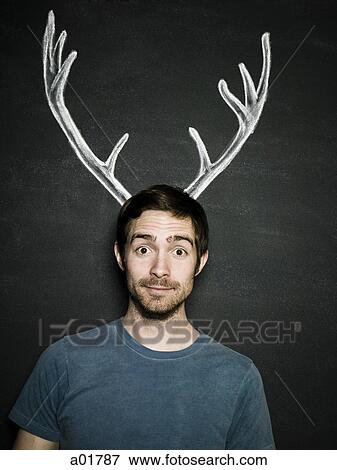 man with antlers View Large Photo Image Stock Photo - man with antlers. Fotosearch