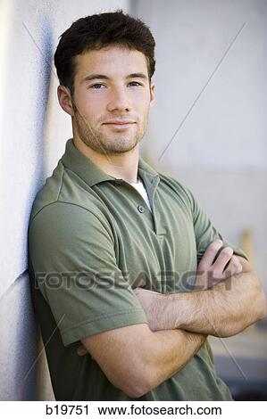 man with arms folded View Large Photo Image Stock Image - man with arms folded. Fotosearch