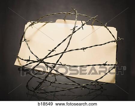 Manila file folder surrounded by barbed wire. View Large Photo Image Stock Photo - Manila file folder surrounded by barbed wire.. Fotosearch
