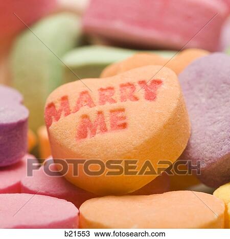 Stock Image - Marry Me candy heart. Fotosearch