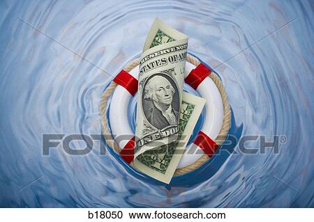 Money in a life saver. View Large Photo Image Stock Image - Money in a life saver.. Fotosearch
