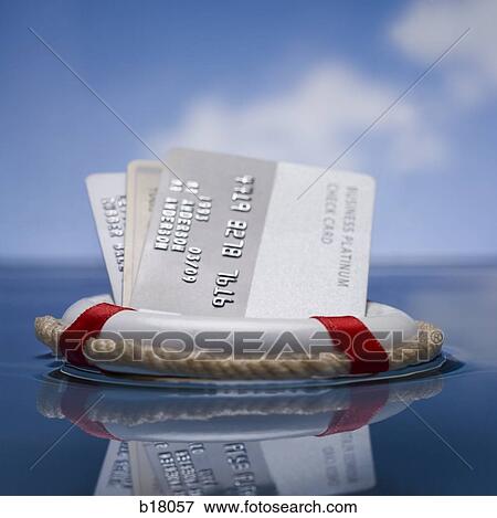 Money in a life saver. View Large Photo Image Stock Photo - Money in a life saver.. Fotosearch