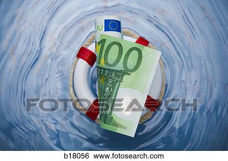 Stock Photograph - Money in a life saver.. Fotosearch