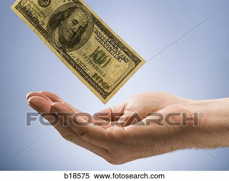 Money into a hand. View Large Photo Image Stock Photography - Money into a hand.. Fotosearch