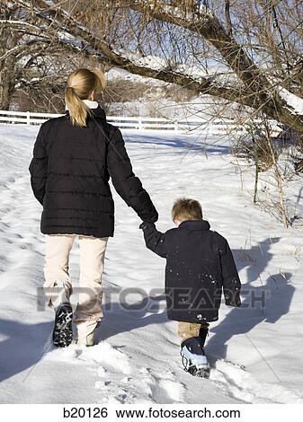 mother and child in the snow View Large Photo Image Stock Photograph - mother and child in the snow. Fotosearch