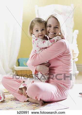 mother and daughter in pajamas View Large Photo Image Stock Image - mother and daughter in pajamas. Fotosearch