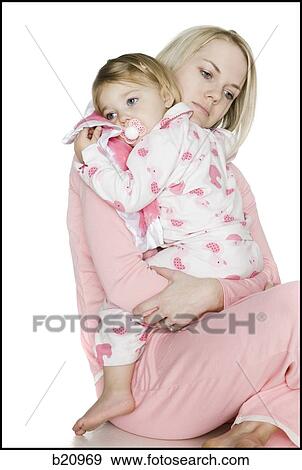 Stock Photo - mother and daughter in pajamas. Fotosearch