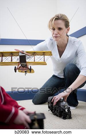 mother and son playing View Large Photo Image Stock Image - mother and son playing. Fotosearch