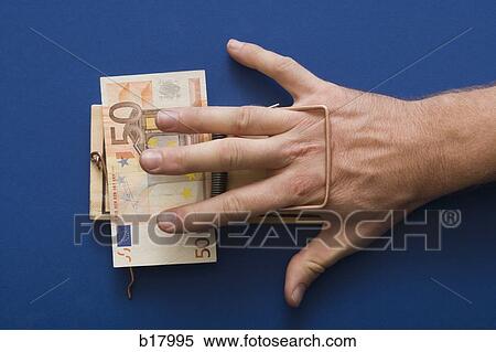 Mouse trap with money as bait. View Large Photo Image Stock Photography - Mouse trap with money as bait.. Fotosearch