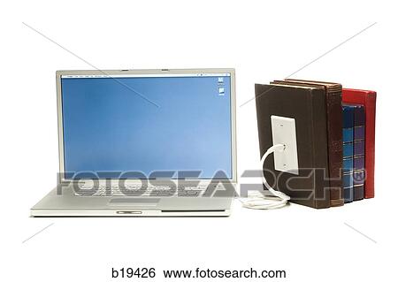 notebook computer plugged into books View Large Photo Image Stock Photograph - notebook computer plugged into books. Fotosearch