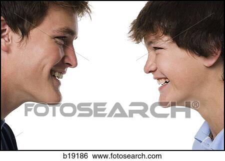 older boy and younger boy head to head. View Large Photo Image Stock Photograph - older boy and younger boy head to head.. Fotosearch