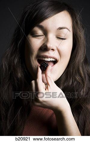 Stock Image - one young woman only, Caucasian Appearance, One Person, Mixed Race Person, Korean Ethnicity, 20-24 years. Fotosearch