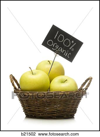 Stock Image - organic apples in a basket. Fotosearch