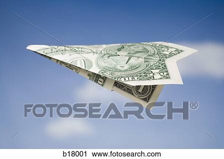 Paper airplane made out of money. View Large Photo Image Stock Image - Paper airplane made out of money.. Fotosearch