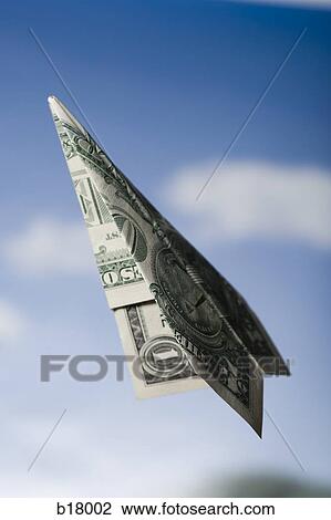 Paper airplane made out of money. View Large Photo Image Stock Image - Paper airplane made out of money.. Fotosearch