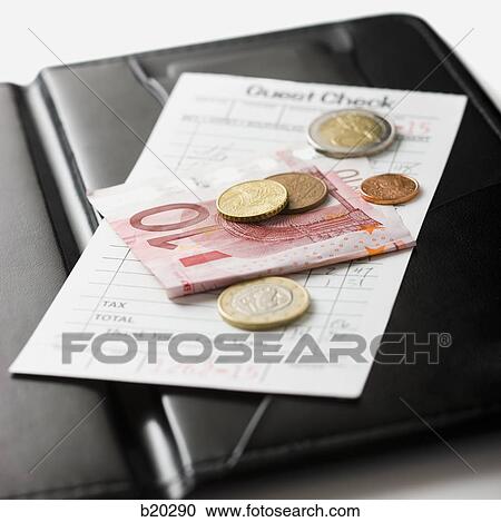 Stock Image - paying a tab. Fotosearch