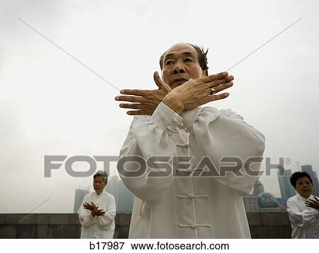 People practicing Tai Chi. View Large Photo Image Stock Photo - People practicing Tai Chi.. Fotosearch