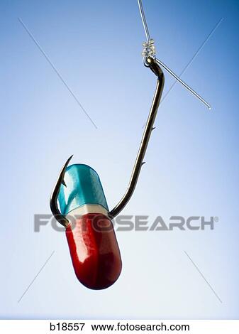 Pill on a fish hook. View Large Photo Image Stock Photo - Pill on a fish hook.. Fotosearch