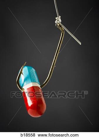 Pill on a fish hook. View Large Photo Image Stock Photo - Pill on a fish hook.. Fotosearch
