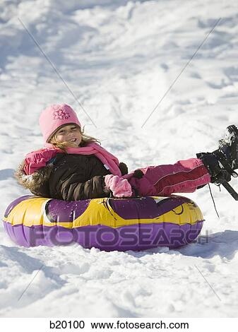 Stock Image - playing in the snow. Fotosearch