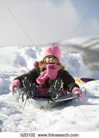 Stock Image - playing in the snow. Fotosearch