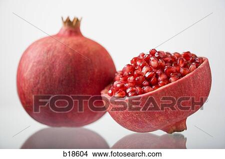 Pomegranate and a half. View Large Photo Image Picture - Pomegranate and a half.. Fotosearch