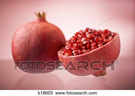 Pomegranate and a half. View Large Photo Image Stock Image - Pomegranate and a half.. Fotosearch