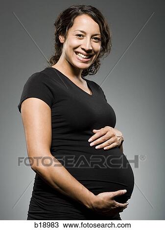Stock Image - Pregnant woman.. Fotosearch