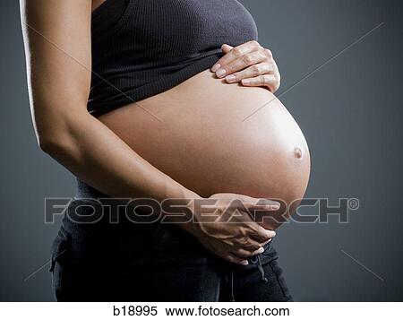Pregnant woman. View Large Photo Image Stock Photography - Pregnant woman.. Fotosearch