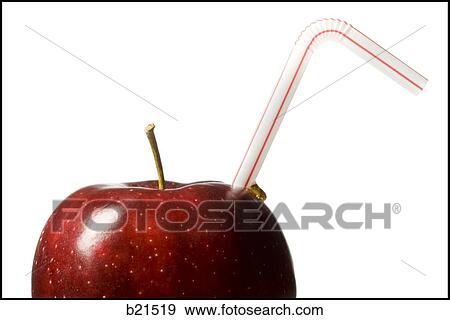 red delicious apple with a straw in it View Large Photo Image Stock Photo - red delicious apple with a straw in it. Fotosearch
