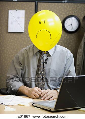 Stock Photo - sad face in the office. Fotosearch
