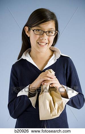 Stock Photograph - school girl. Fotosearch