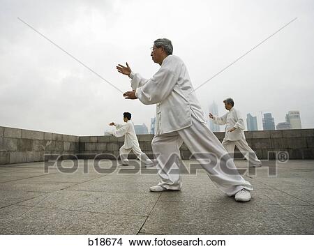 Seniors practicing tai chi. View Large Photo Image Picture - Seniors practicing tai chi.. Fotosearch